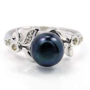 Срібна каблучка 925 проби 3,88 гр. з чорною перлиною Камока о.Таїті та топазами зі США 3,41 карат
