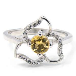 Срібна каблучка 925 проби 2,43 гр. з цитрином зі США та топазами зі США 0,55 карат