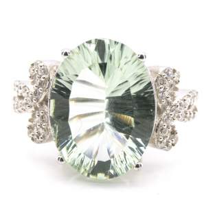 Серебряное кольцо 925 пробы 5,61 гр. с зеленым аметистом лазерной огранки и цирконами 7,76 карат Серебряное кольцо 925 пробы 5,61 гр. с зеленым аметистом лазерной огранки и цирконами 7,76 карат