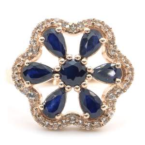 Срібна каблучка 925 проби в позолоті 750 проби 4,65 гр. зі шрі-ланкійськими блакитними сапфірами класу AAA та топазами зі США 2,09 карат