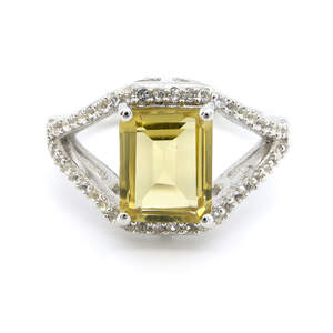 Серебряное кольцо 925 пробы 4,84 г с боливийским гелиодором и белыми топазами с США 3,05 карат