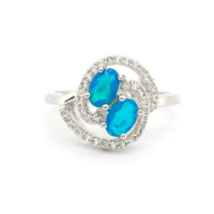 Серебряное кольцо 925пр 3,58г с голубыми эфиопскими опалами АААА и топазами из США 0,85к