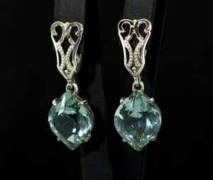 Срібні сережки 925 проби з золотом 375 проби 9,96 г з зеленими Кварцами 10,36 карат Срібні сережки 925 проби з золотом 375 проби 9,96 г з зеленими Кварцами 10,36 карат