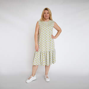 Сукня сірого кольору в жовтий горох з воланом