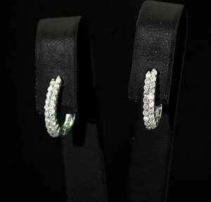 Срібні сережки 925 проби 1,77 г з африканськими Діамантами VVS1 0,32 карат Срібні сережки 925 проби 1,77 г з африканськими Діамантами VVS1 0,32 карат