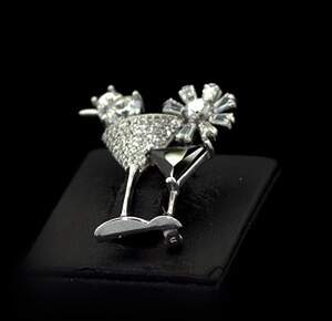 Срібна брошка 925 проби 5,85 г з білими та чорними Альпінітами та цирконами 6,6 карат