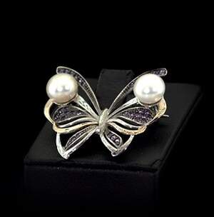 Срібна брошка 925 проби з позолотою 375 проби 4,65 г з Перлинами та цирконами 4,22 карат