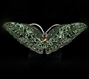 Срібне брошка 925 проби 22,15 г з зеленими Альпінітами та цирконами 13,2 карат