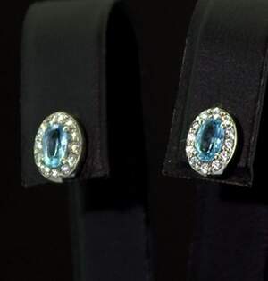 Срібні сережки 925 проби 2,11 г з блакитними Топазами та фіанітами 1,33 карат
