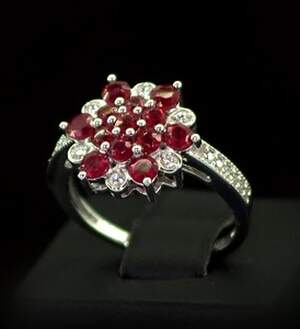Срібна каблучка 925 проби 3,23 г з африканськими Роял рубінами класу AAAA та топазами зі США 1,89 карат