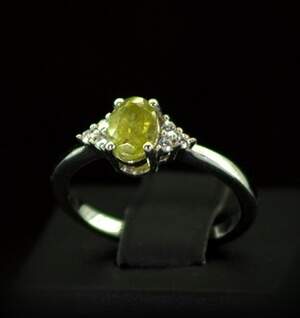 Срібна каблучка 925 проби 2,49 г з норвезьким Сфеном класу АААА та топазами зі США 1,13 карат