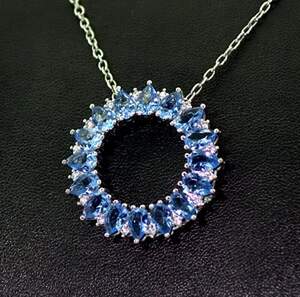 Підвіска у срібному покритті з Танзанітами класу АААА та цирконами 8,14 карат Підвіска у срібному покритті з Танзанітами класу АААА та цирконами 8,14 карат