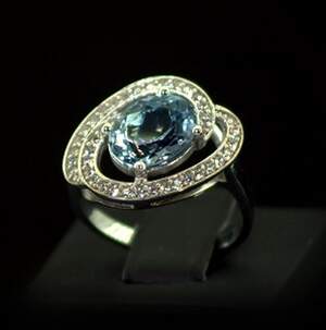 Срібна каблучка 925 проби 4,36 г з блакитним Топазом та фіанітами 3,61 карат Срібна каблучка 925 проби 4,36 г з блакитним Топазом та фіанітами 3,61 карат