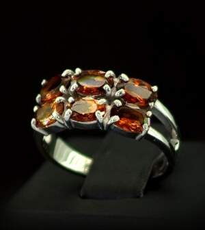 Срібна каблучка 925 проби 3,66 г з мандариновими Гранатами 2,82 карат Срібна каблучка 925 проби 3,66 г з мандариновими Гранатами 2,82 карат