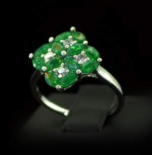 Срібна каблучка 925 проби 3,11 г з зеленими ефіопськими Опалами класу АААА та топазами зі США 2,71 карат