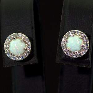 Срібні сережки 925 проби 2,31 г з гідротермальними Опалами та цирконами 0,85 карат Срібні сережки 925 проби 2,31 г з гідротермальними Опалами та цирконами 0,85 карат