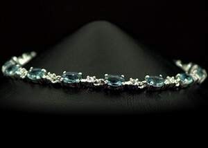 Срібний браслет 925 проби 7,37 г з Топазами Лондон Блу зі США та цирконами 4,76 карат 17-20 см Срібний браслет 925 проби 7,37 г з Топазами Лондон Блу зі США та цирконами 4,76 карат 17-20 см