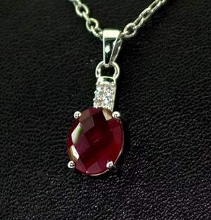 Срібна підвіска 925 проби 1,56 г з африканським Роял Рубіном класу АААА та цирконами 3,23 карат Срібна підвіска 925 проби 1,56 г з африканським Роял Рубіном класу АААА та цирконами 3,23 карат