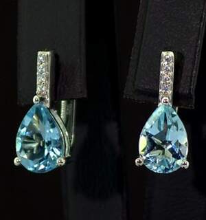 Срібні сережки 925 проби 3,54 г з блакитними Топазами та цирконами 4,51 карат Срібні сережки 925 проби 3,54 г з блакитними Топазами та цирконами 4,51 карат