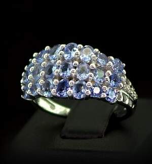 Серебряное кольцо 925 пробы 5,03 гр. с Танзанитами класса АААА и топазами из США 2,73 карат Серебряное кольцо 925 пробы 5,03 гр. с Танзанитами класса АААА и топазами из США 2,73 карат