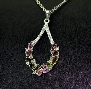 Серебряная подвеска 925 пробы 4,85 гр. с радужными Турмалинами и топазами из США 3,48 карат Серебряная подвеска 925 пробы 4,85 гр. с радужными Турмалинами и топазами из США 3,48 карат