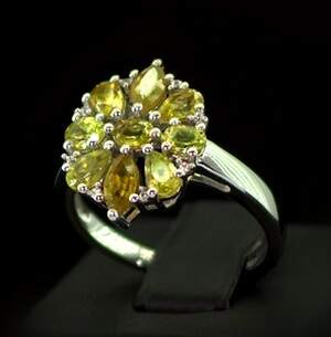 Серебряное кольцо 925 пробы 3,6 гр. с норвежским Сфеном и топазами из США 2,26 карат Серебряное кольцо 925 пробы 3,6 гр. с норвежским Сфеном и топазами из США 2,26 карат