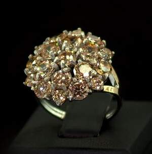 Серебряное кольцо 925 пробы с позолотой 375 пробы 5,93 г с желтыми Фианитами 8,95 карат Серебряное кольцо 925 пробы с позолотой 375 пробы 5,93 г с желтыми Фианитами 8,95 карат