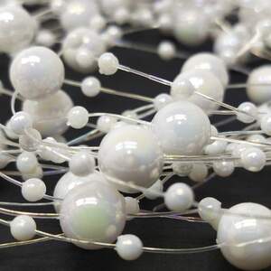 (5шт по 1,3 метра) Бусины на леске Ø8 и Ø3мм Цвет - белый с АВ (5шт по 1,3 метра) Бусины на леске Ø8 и Ø3мм Цвет - белый с АВ