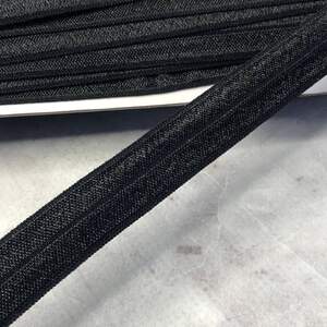 Черная - Трикотажная (эластичная) окантовочная бейка с блеском 1,5см х 1м Черная - Трикотажная (эластичная) окантовочная бейка с блеском 1,5см х 1м