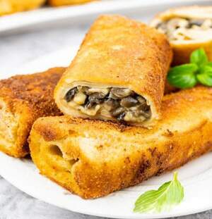 Млинці з грибами